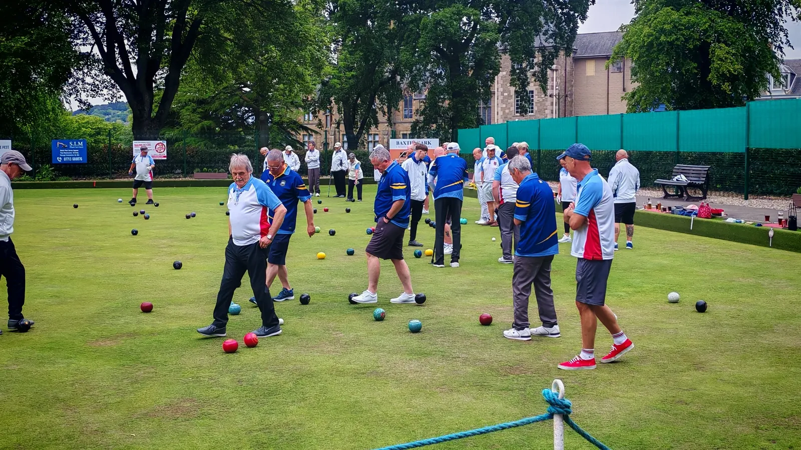 Players from both clubs around the head during a match