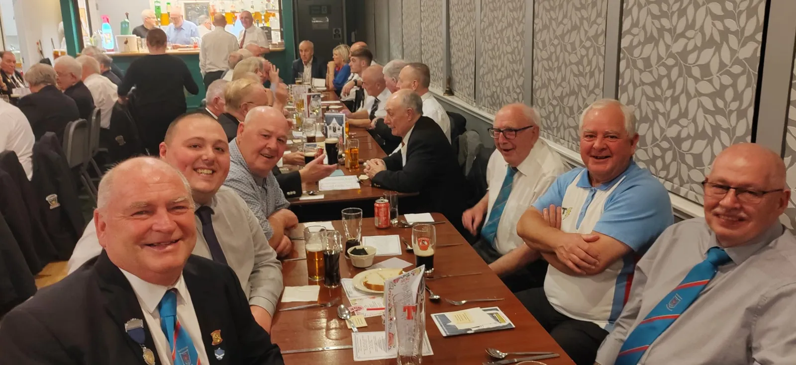 Members enjoying a meal together