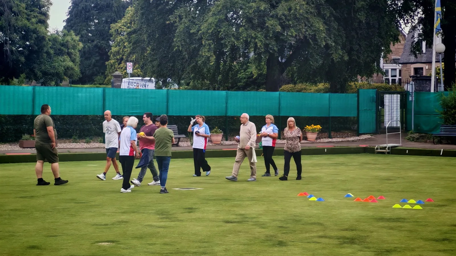 Members on the green during a coaching session
