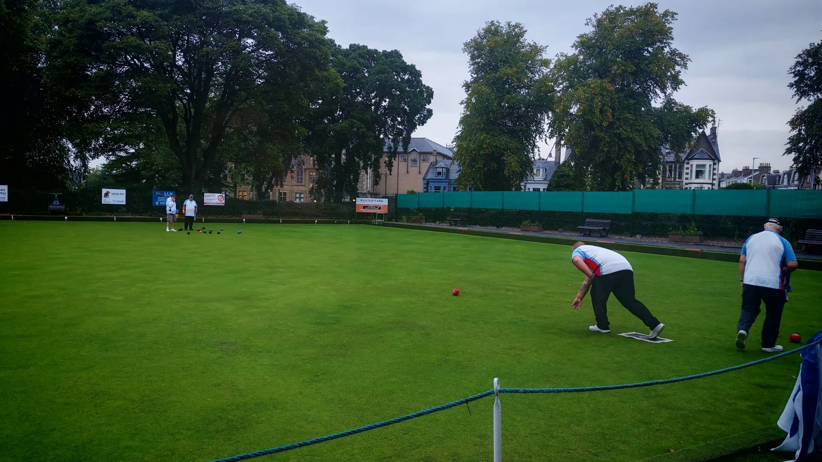 A bowler delivering a bowl on the Baxter Park green